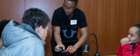 DeKwuan Stokes, a graduate student in the Swanson School of Engineering, mentors high school students DeKwuan Stokes, a graduate student in the Swanson School of Engineering, mentoring high school students